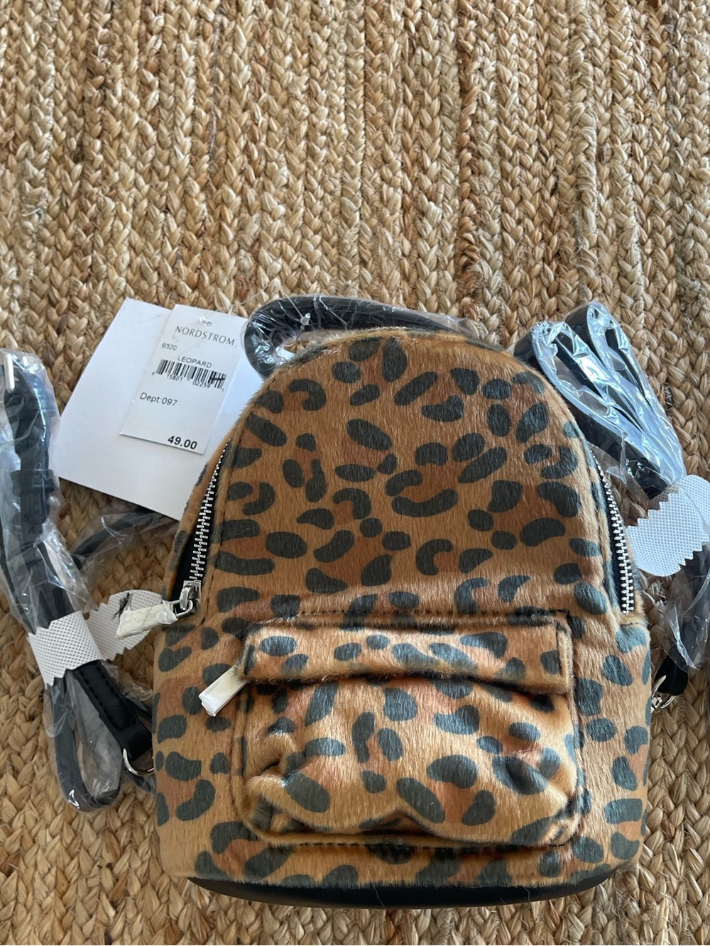 Nordstrom NWT leopard print faux-fur mini backpack purse.
